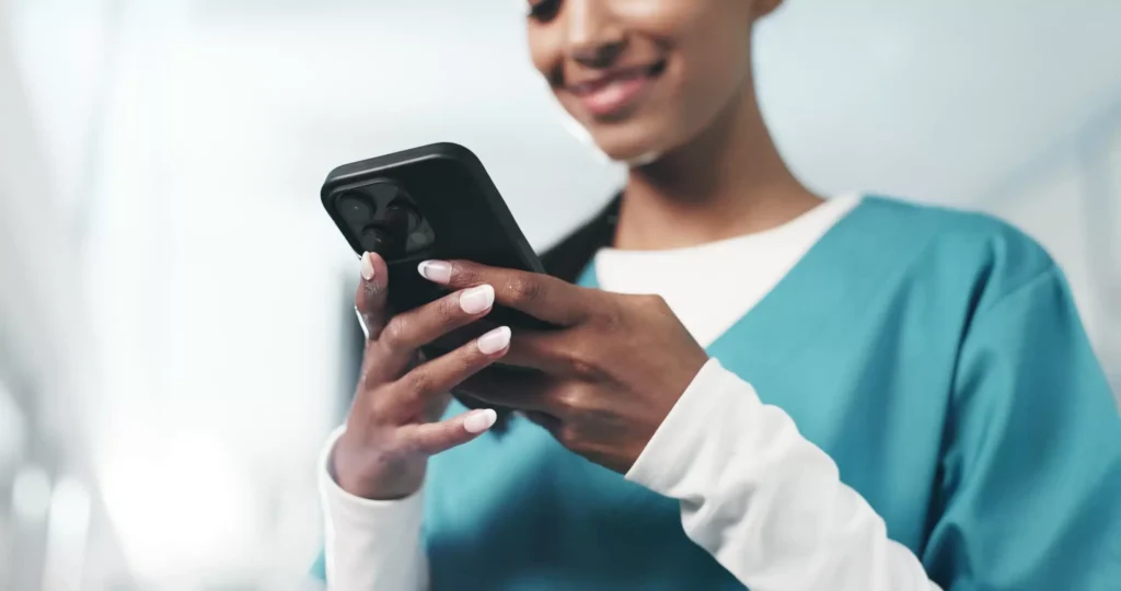 a woman holding a phone