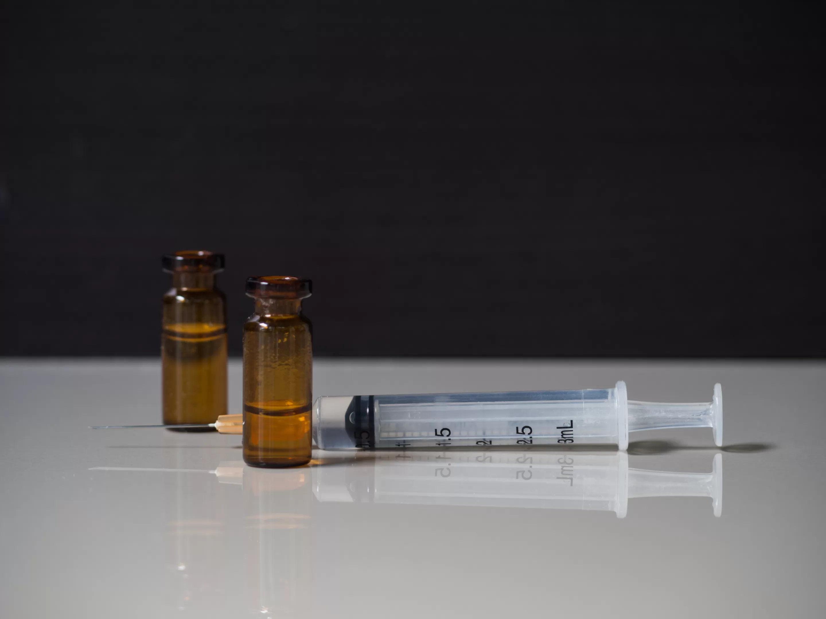 Ketamine Ketamine in Syringe on Logo on White Floor,Speed Drug Education