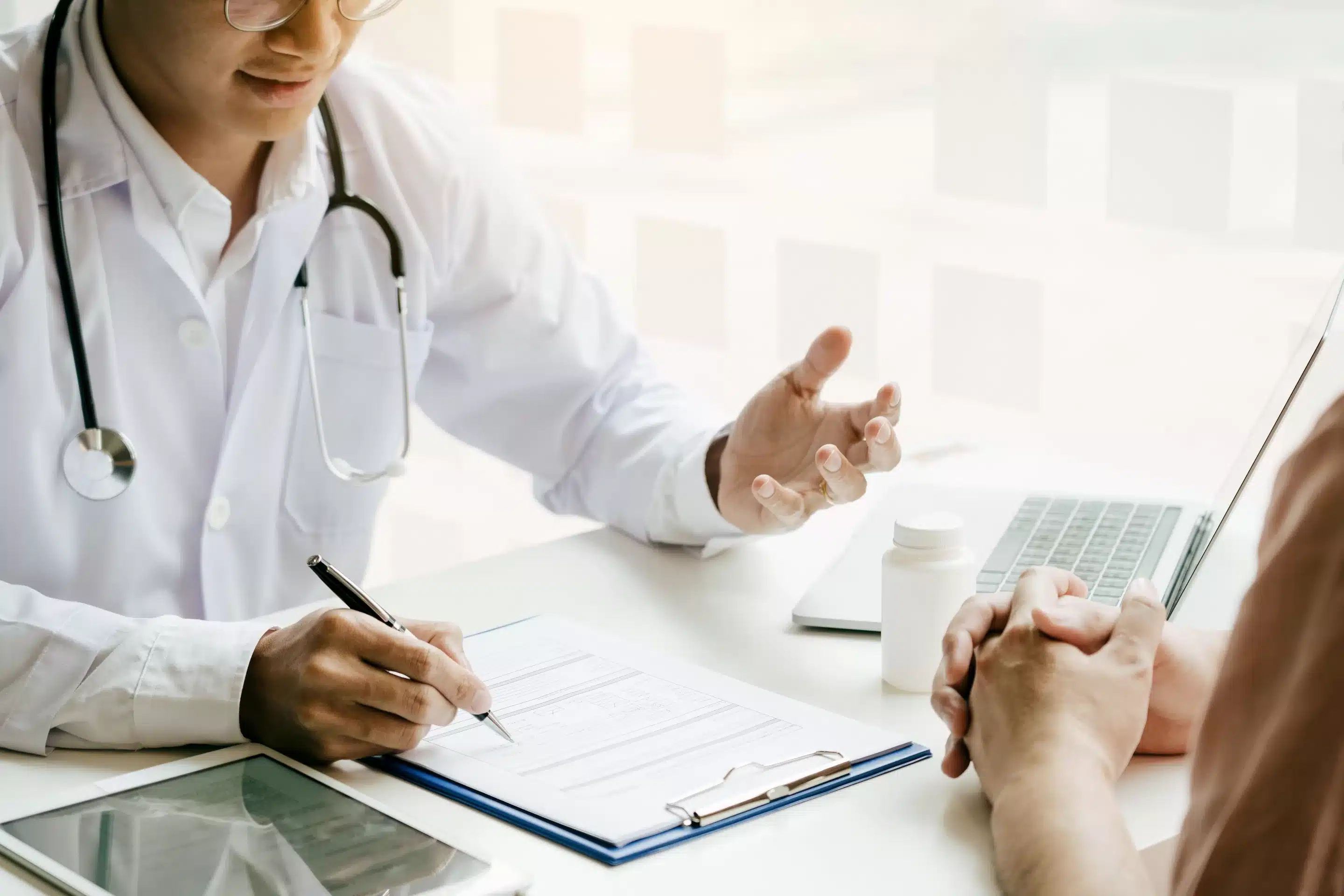 a doctor talking to a patient