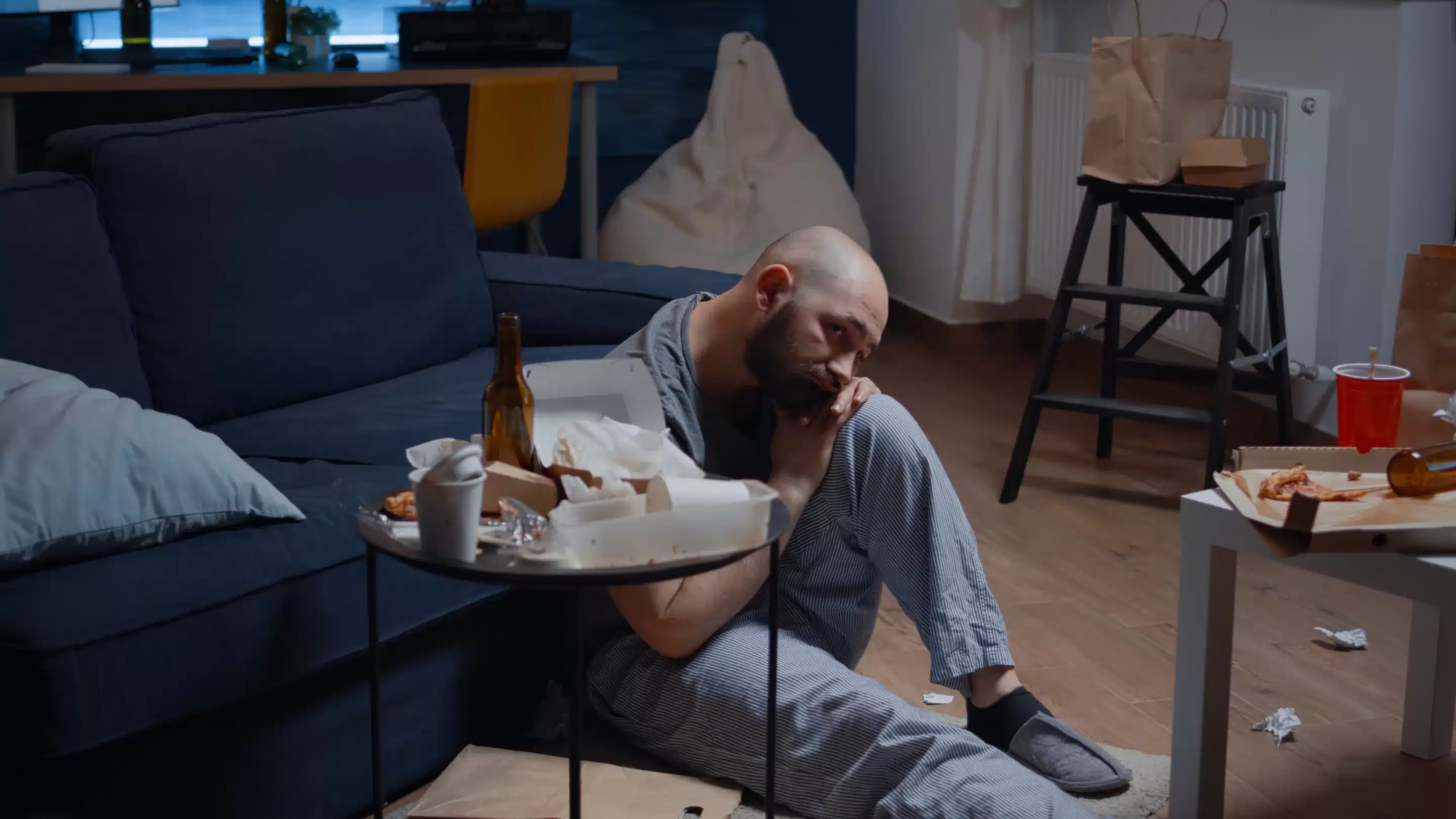 Ketamine Depressed, disappointed, frustrated, ill man sitting on floor, feeling stressed,