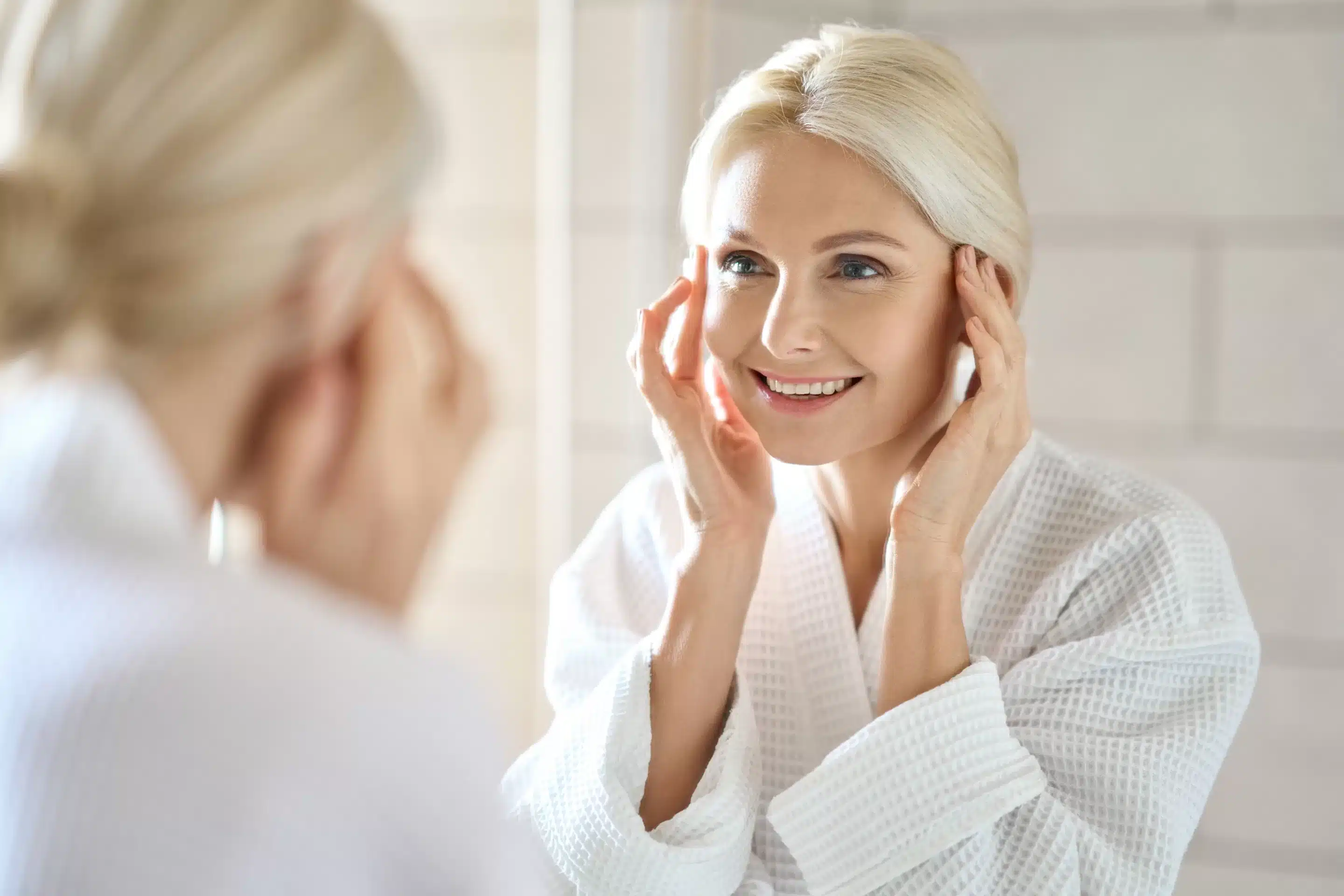 a woman touching her face