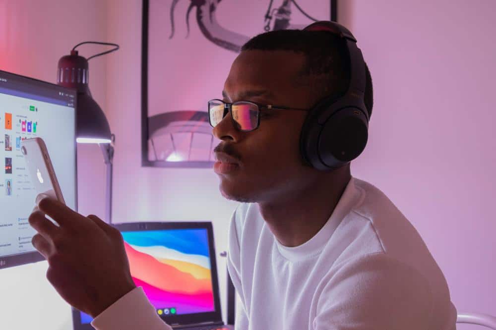 man in white crew neck shirt wearing black headphones man in white crew neck shirt wearing black headphones - adhd