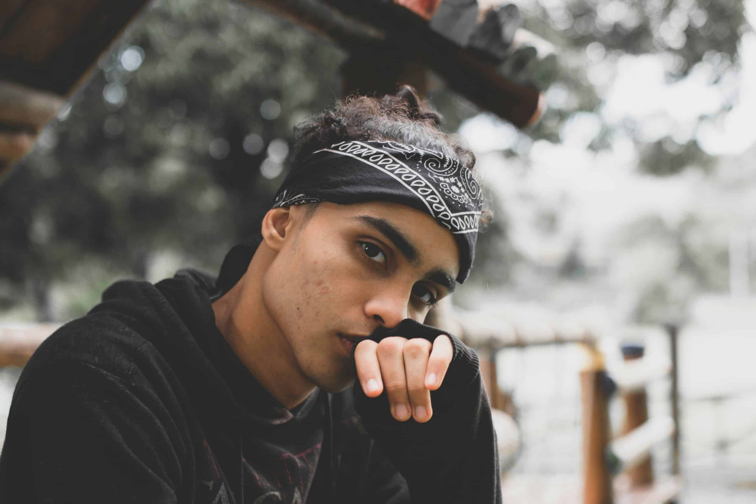 Man looking at camera contemplative